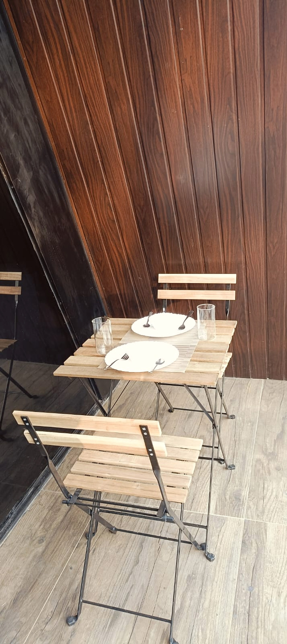 Breakfast table and chairs on the private deck